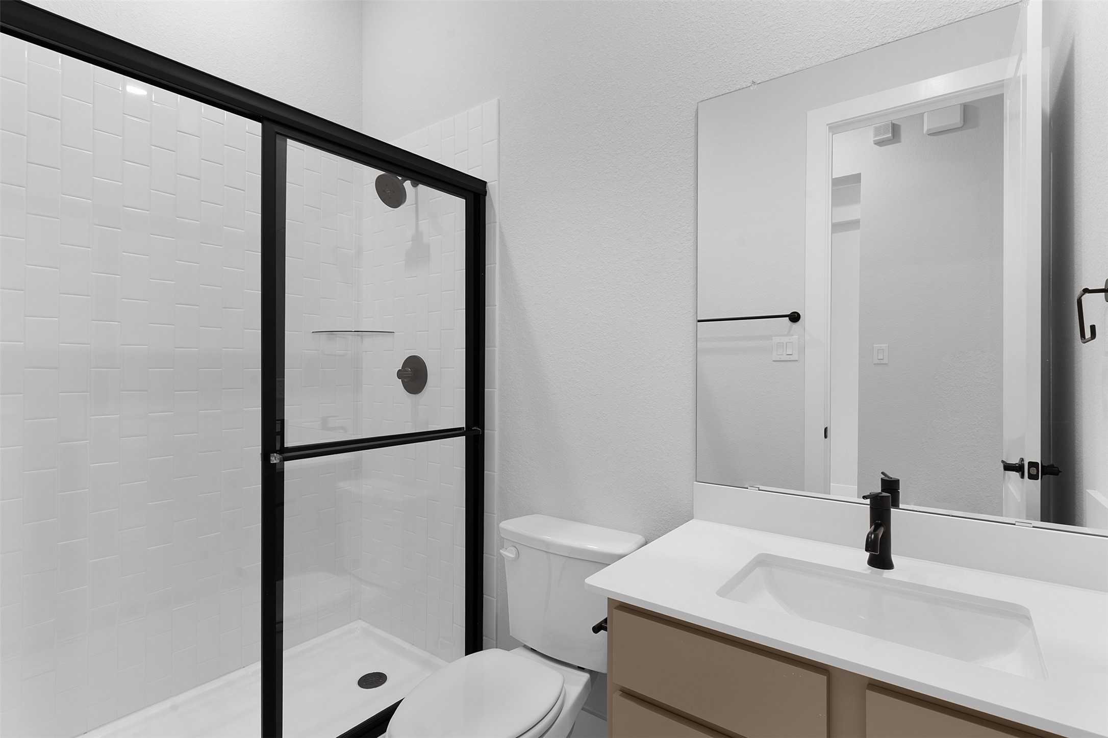 2212 Tobiano Trace Georgetown, TX 78633 - Photo 6 of 26 a bathroom with a sink toilet and shower