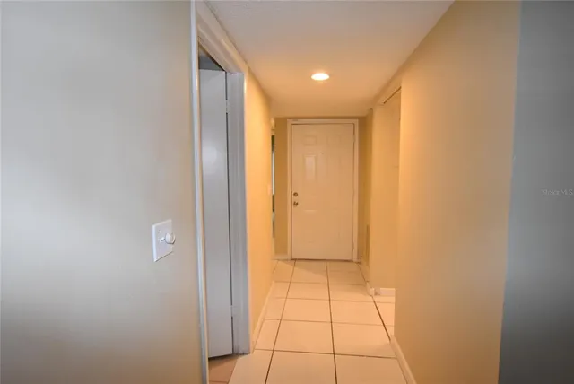 a view of hallway with natural light