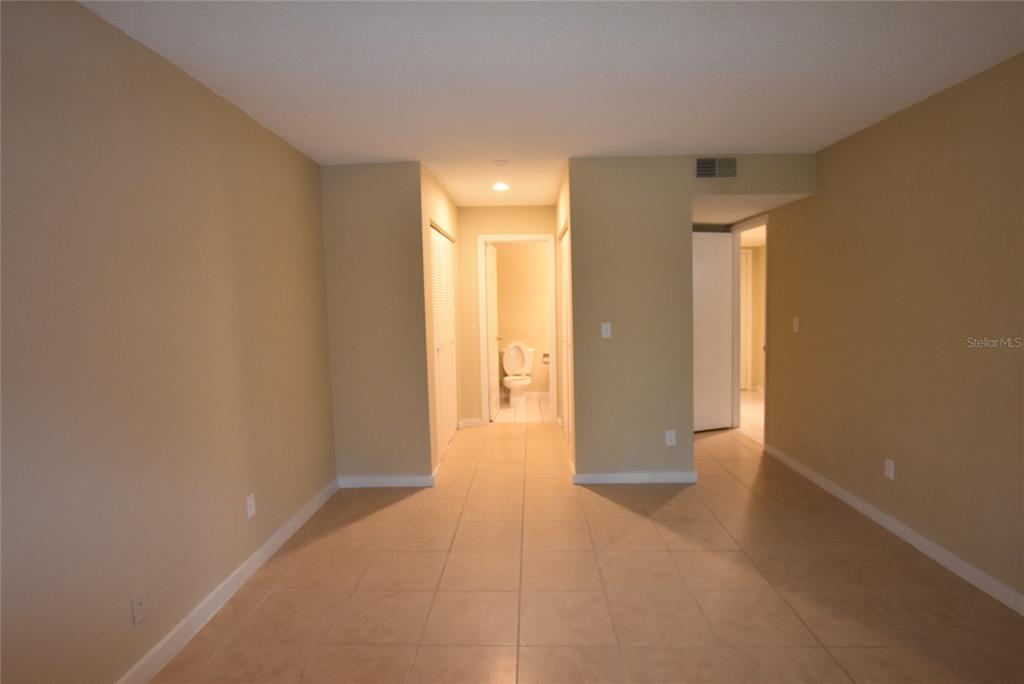 5323 Indian Creek Drive, Unit D Orlando, FL 32811 - Photo 15 of 23 a view of hallway with natural light