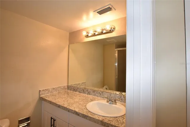 wooden floor and window in an empty room
