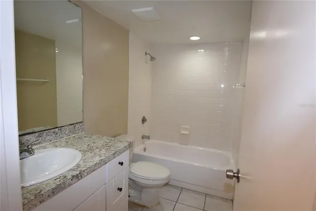 an empty room with closet area