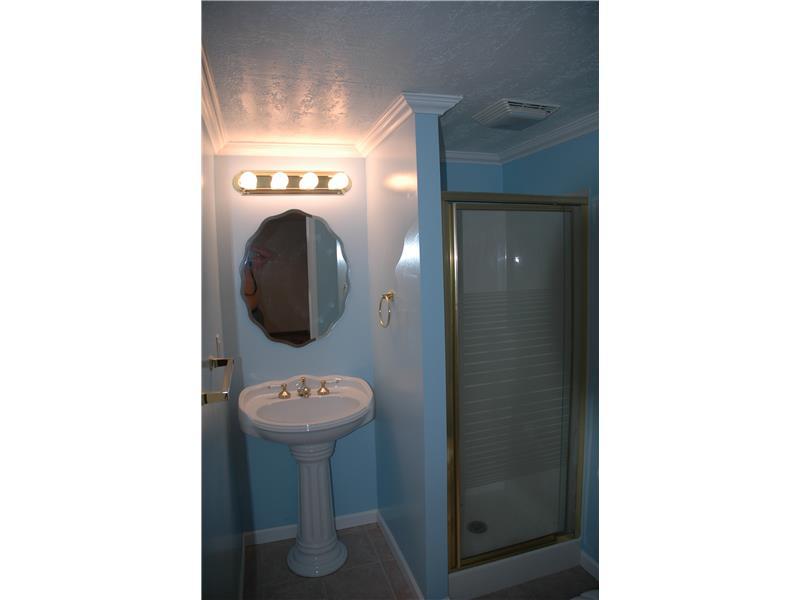 21 Profio Road McDonald, PA 15057 - Photo 8 of 12 Full Bath. Full bath in the lower level off of the family room.