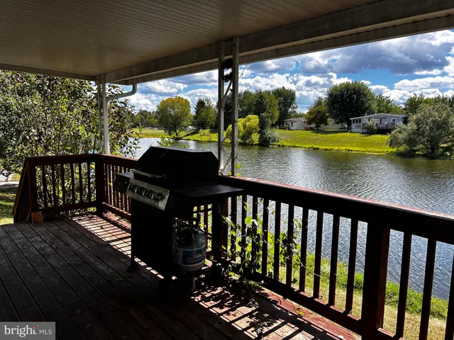 a view of a chairs and table in the patio