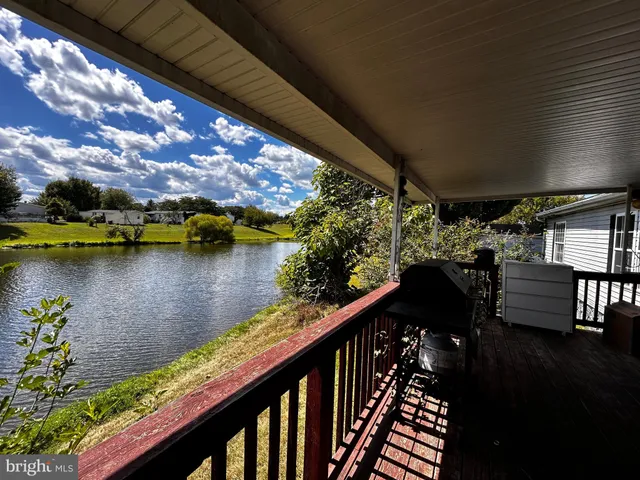 a view of a lake from a balcony
