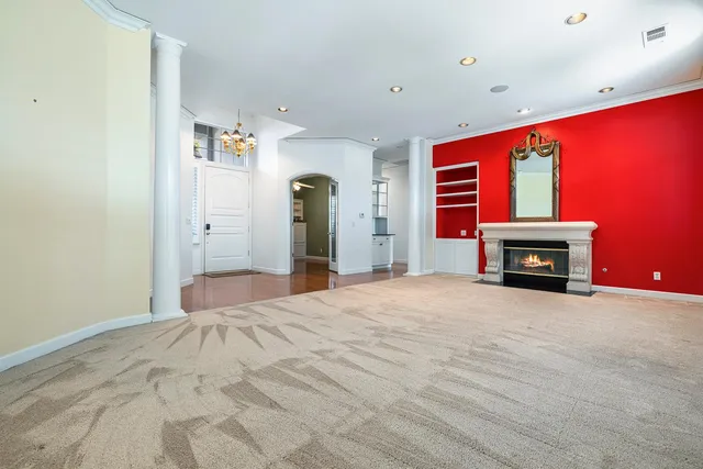 a view of fireplace and windows