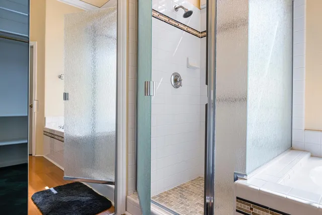 a view of backyard with plants and outdoor seating