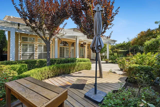 a view of a house with a garden