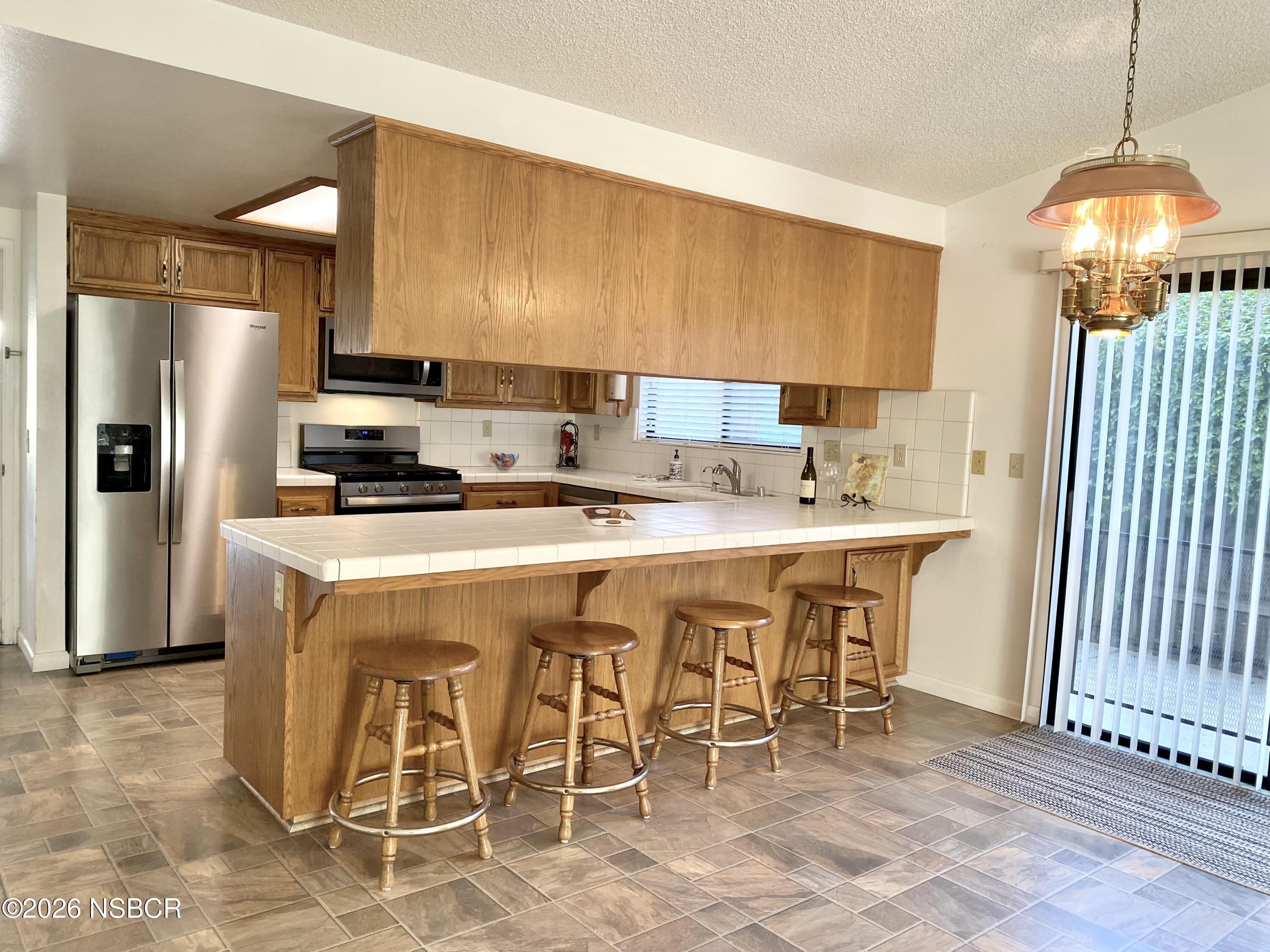 106 Galaxy Way Lompoc, CA 93436 - Photo 9 of 44 Kitchen and Dining