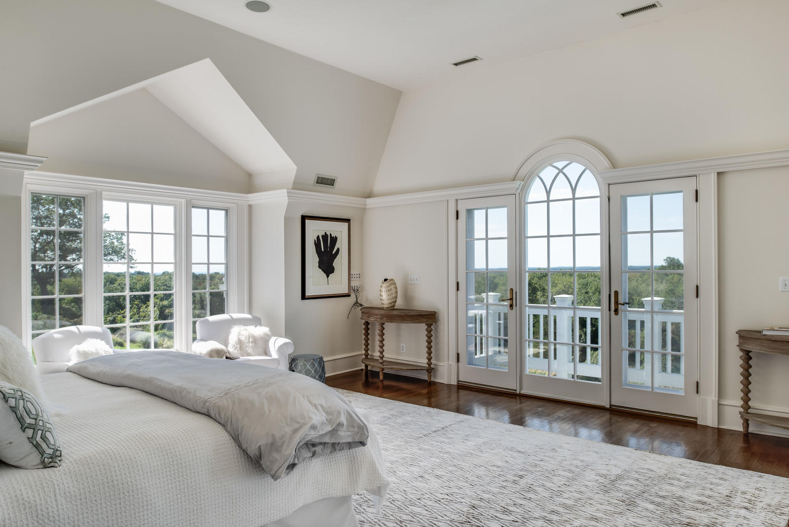 84 Turtle Back Road New Canaan, CT 06840 - Photo 17 of 35 a bedroom with a large bed and large windows