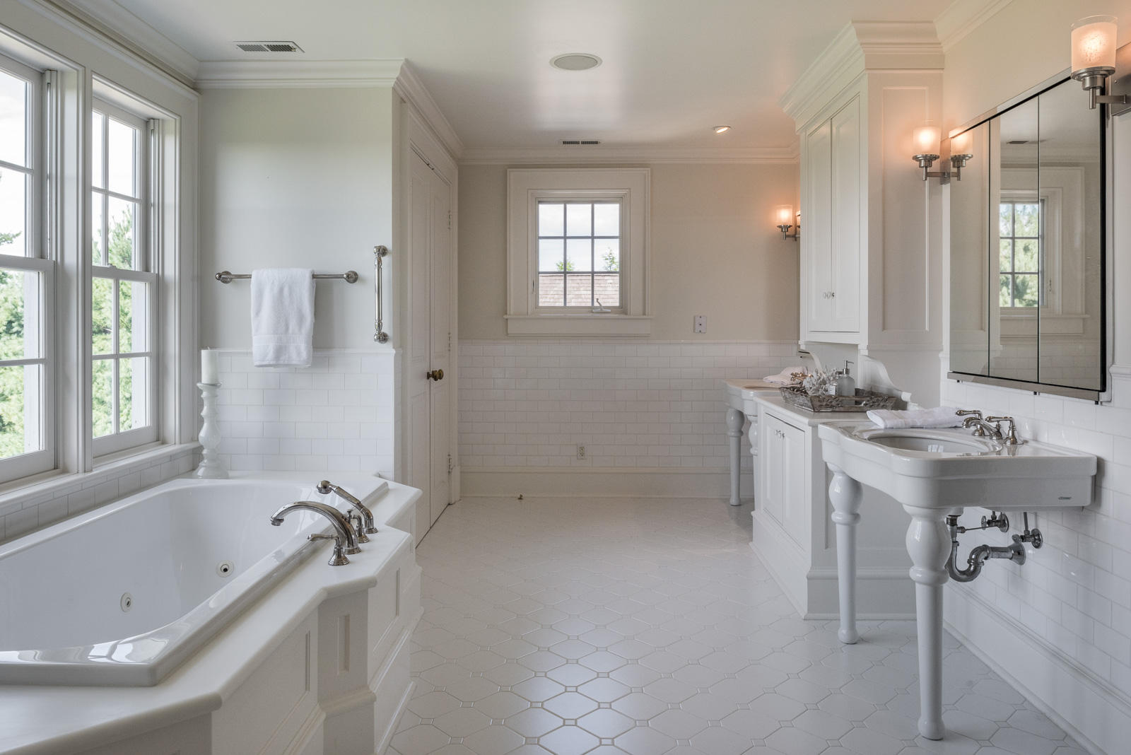 84 Turtle Back Road New Canaan, CT 06840 - Photo 18 of 35 a bathroom with a tub sink double vanity granite and a bathtub