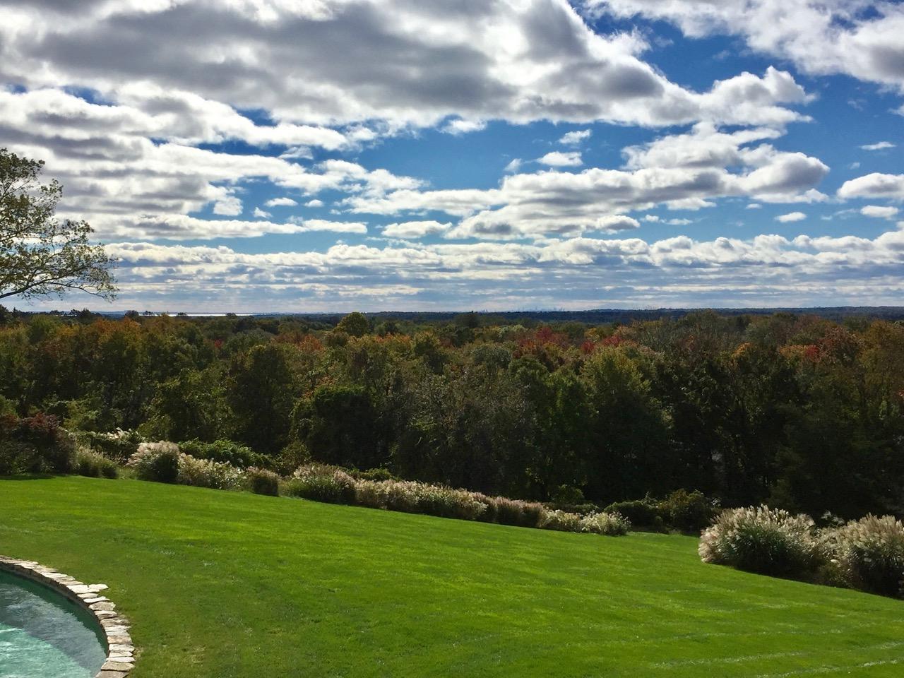 84 Turtle Back Road New Canaan, CT 06840 - Photo 29 of 35 a view of a lake with a yard