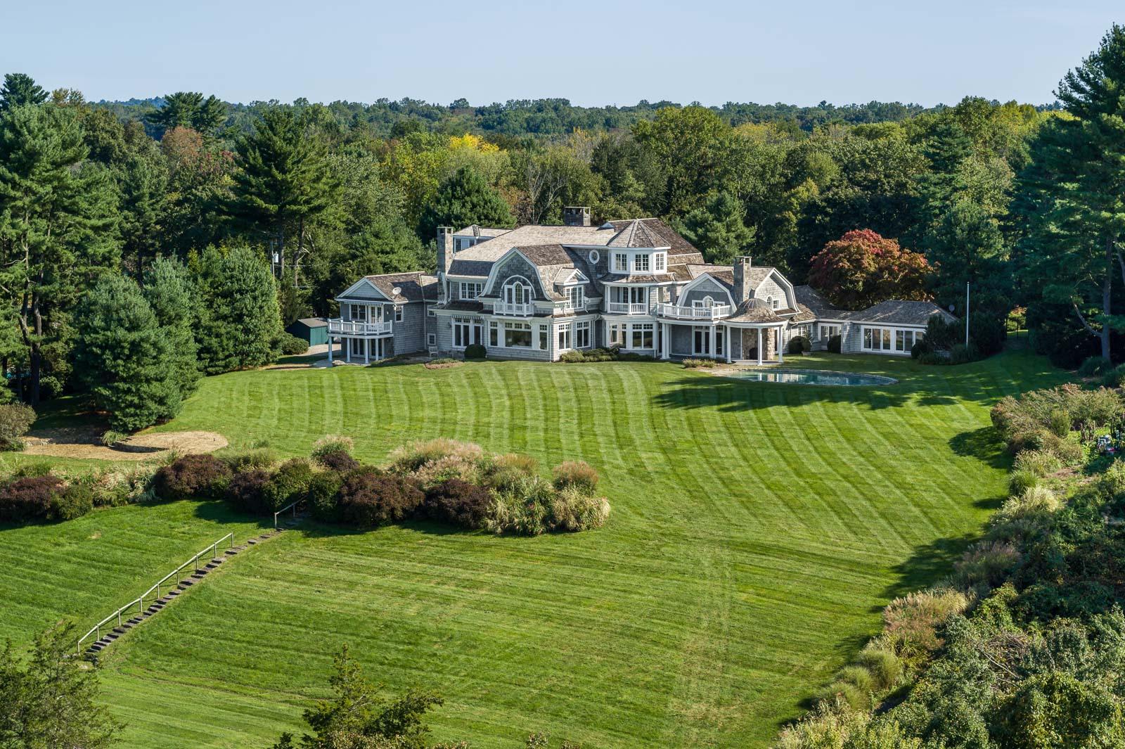 84 Turtle Back Road New Canaan, CT 06840 - Photo 30 of 35 a view of a house with a big yard
