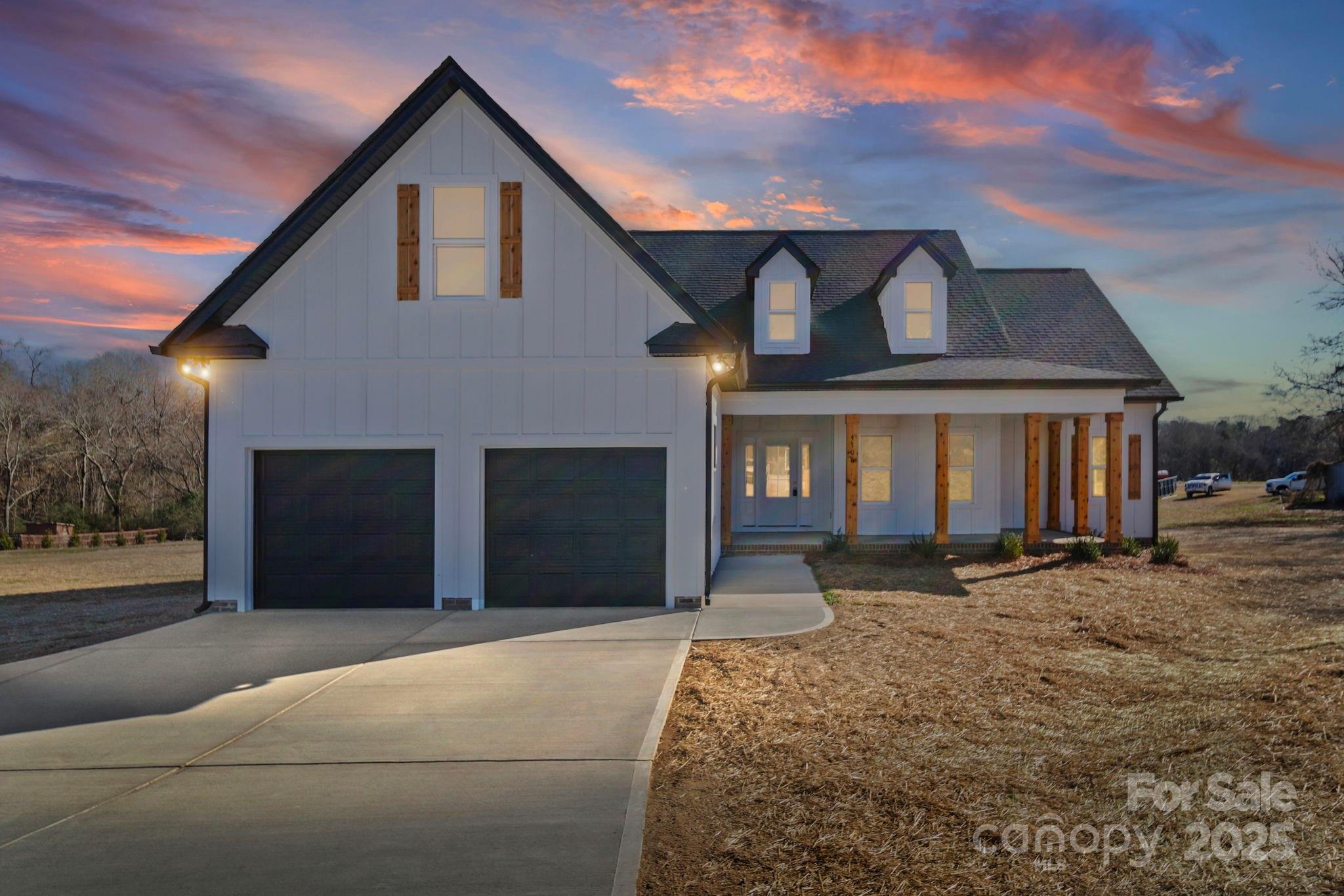 4106 New Salem Road Marshville, NC 28103 - Photo 2 of 46 a front view of a house with a yard