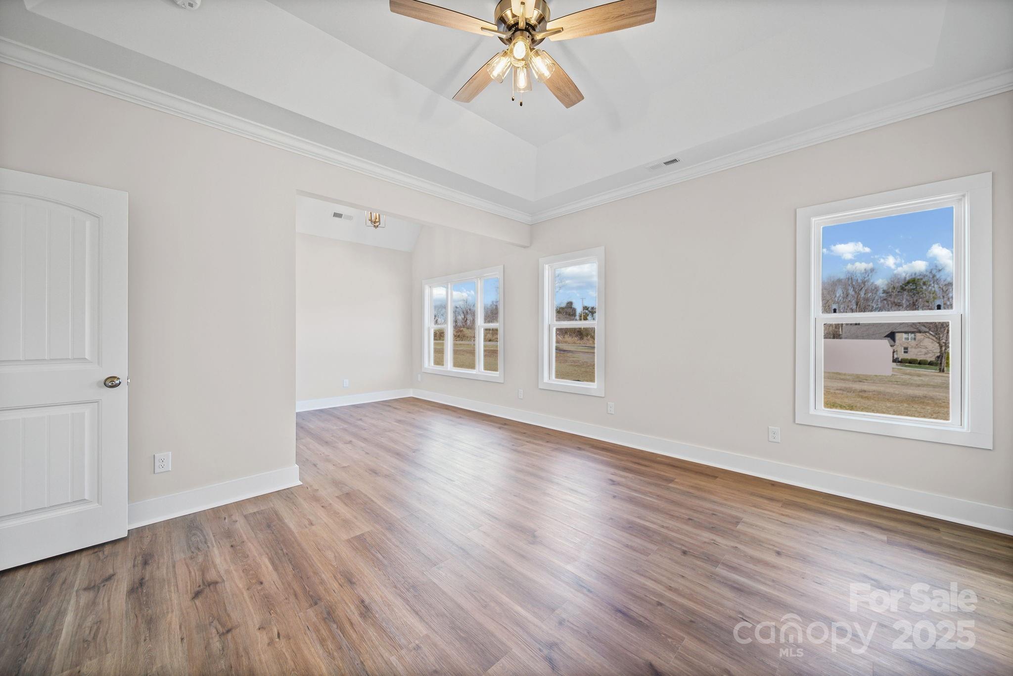 4106 New Salem Road Marshville, NC 28103 - Photo 24 of 46 a view of an empty room with window and wooden floor