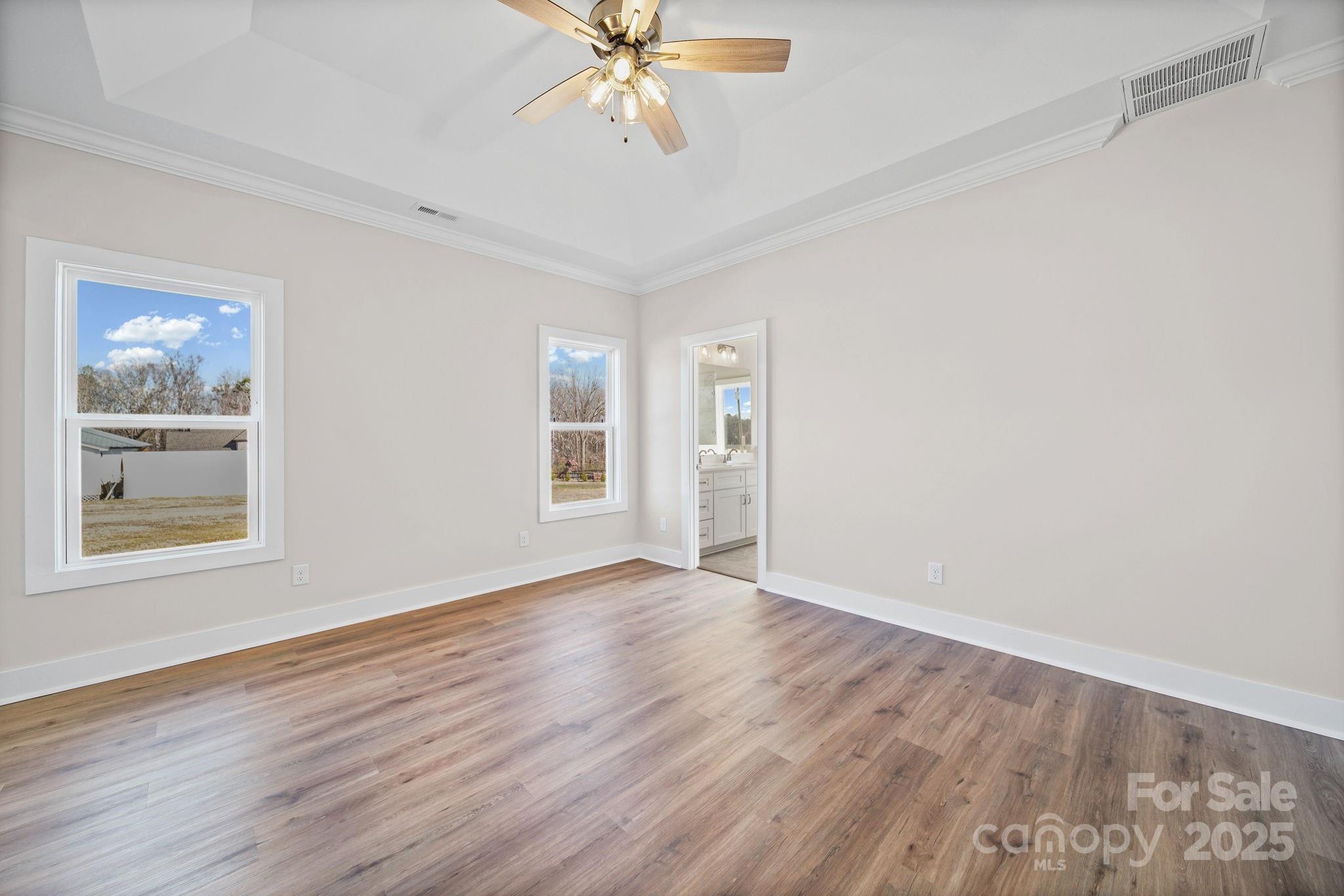 4106 New Salem Road Marshville, NC 28103 - Photo 27 of 46 a view of an empty room with wooden floor and a window
