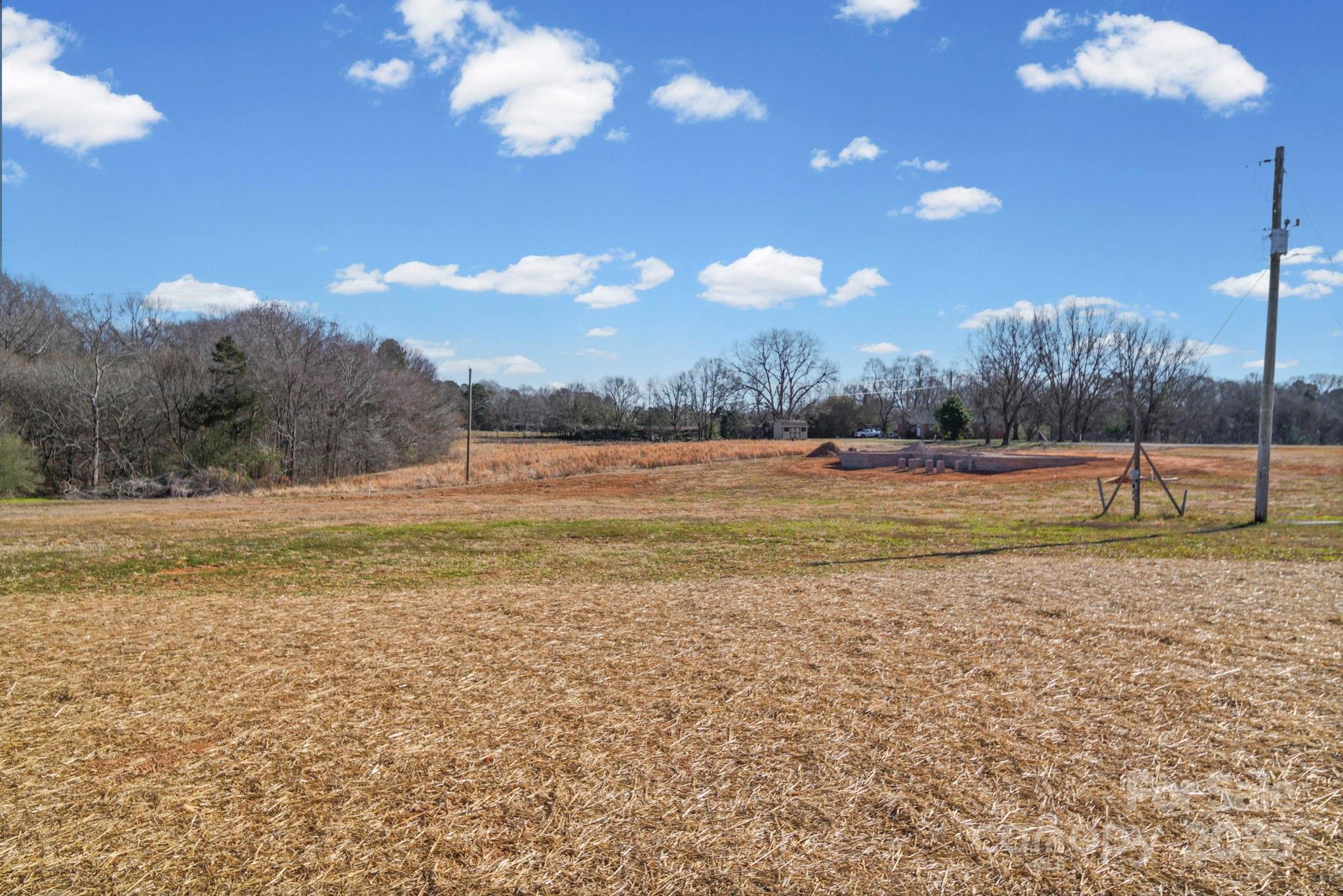 4106 New Salem Road Marshville, NC 28103 - Photo 45 of 46 a view of a golf course with a lake