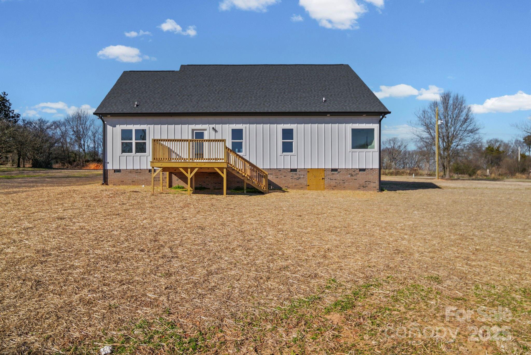 4106 New Salem Road Marshville, NC 28103 - Photo 7 of 46 a front view of a house with a yard and garage