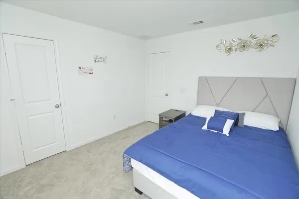 a view of a workspace with furniture