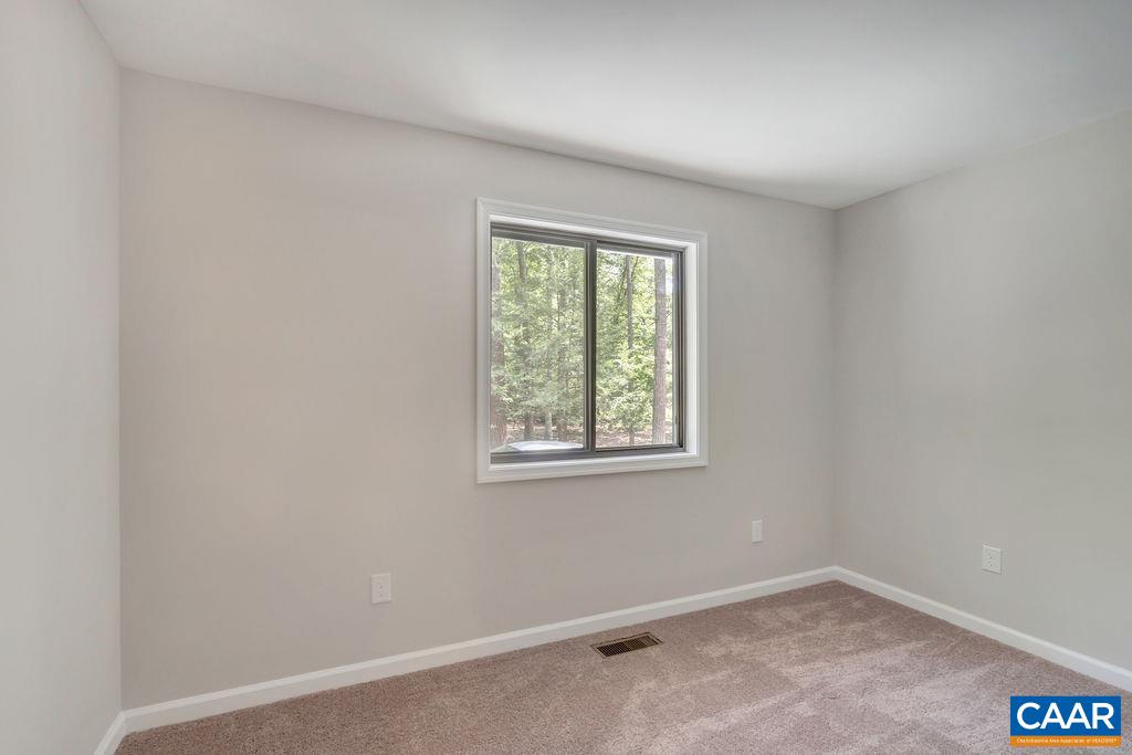 26 Dogleg Road Palmyra, VA 22963 - Photo 12 of 48 an empty room with a window