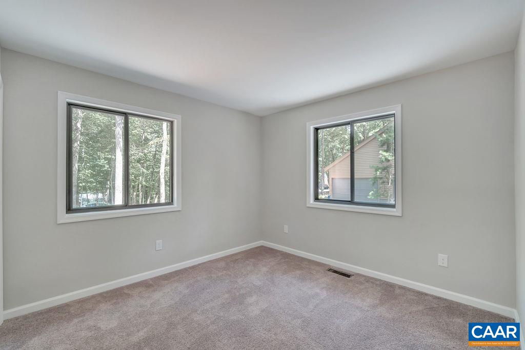 26 Dogleg Road Palmyra, VA 22963 - Photo 13 of 48 an empty room with windows