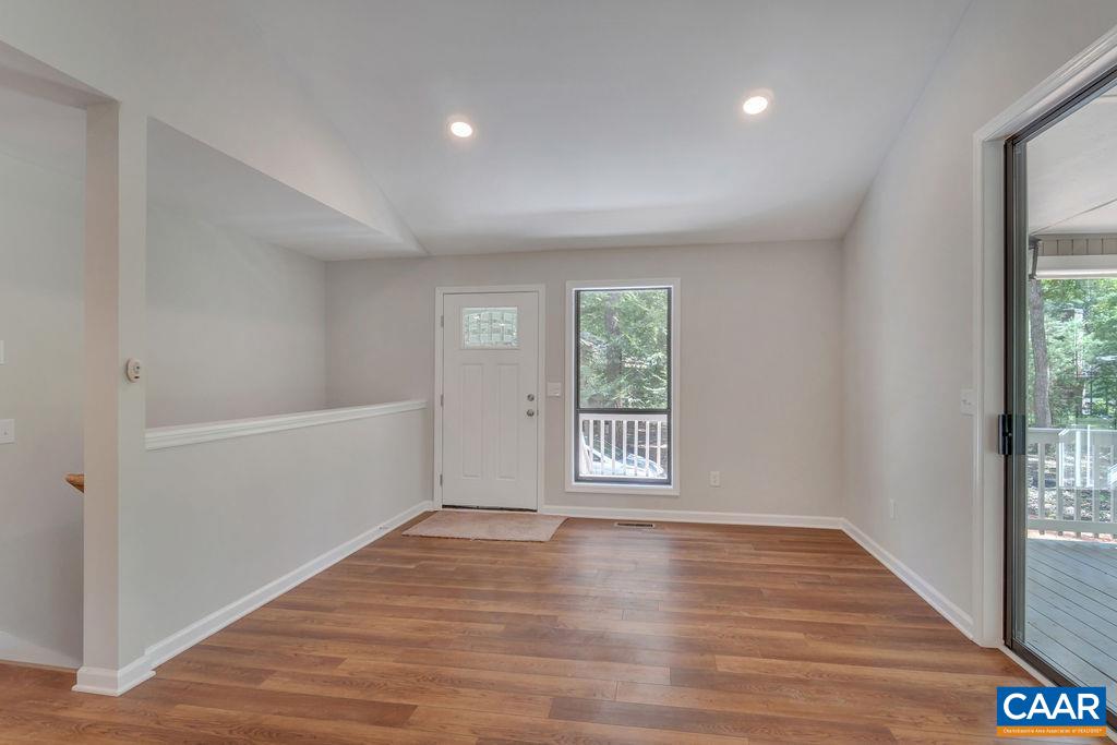 26 Dogleg Road Palmyra, VA 22963 - Photo 20 of 48 wooden floor in an empty room with a window