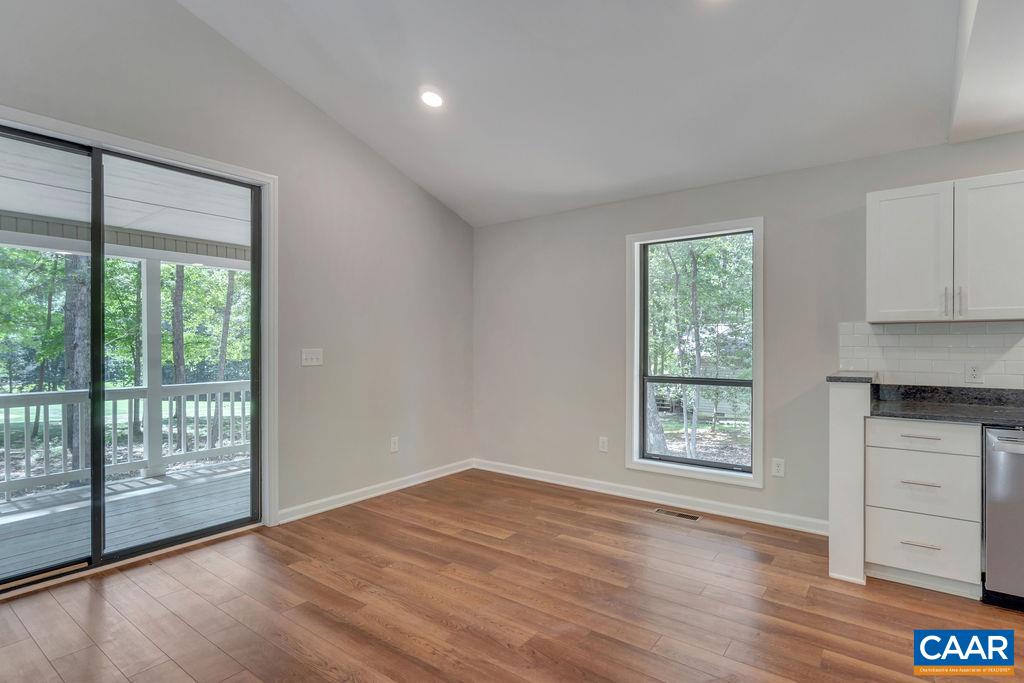 26 Dogleg Road Palmyra, VA 22963 - Photo 23 of 48 an empty room with wooden floor and windows