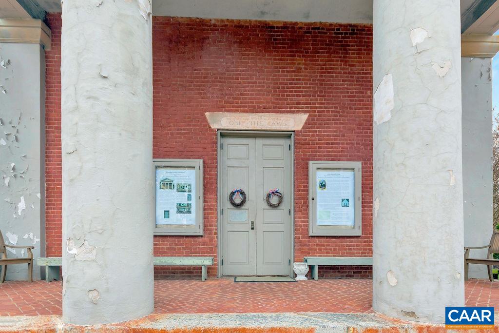 26 Dogleg Road Palmyra, VA 22963 - Photo 38 of 48 a front view of a building with a glass door