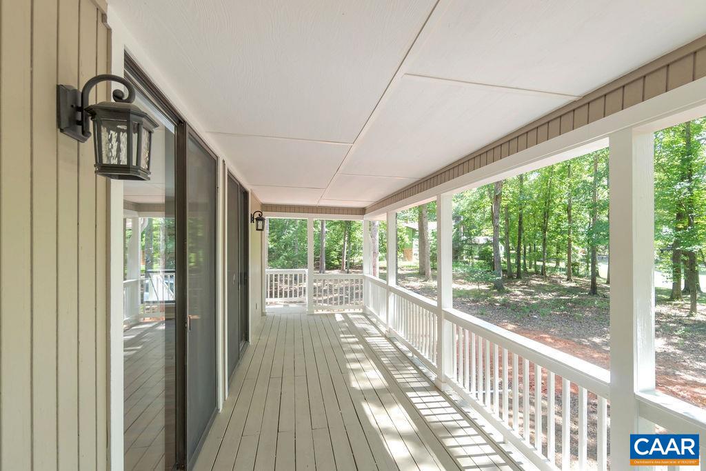 26 Dogleg Road Palmyra, VA 22963 - Photo 8 of 48 a view of a porch and wooden floor