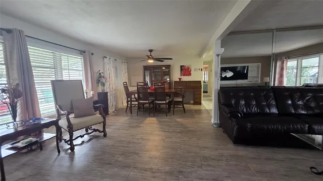 a living room with furniture and a window