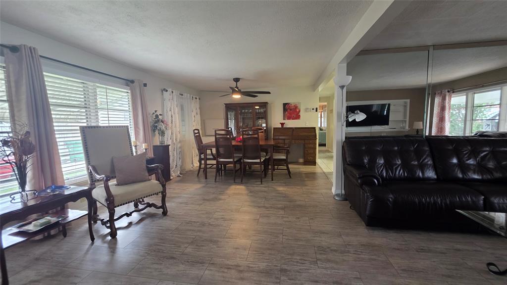 1931 Southwest 85th Avenue Davie, FL 33324 - Photo 19 of 35 a living room with furniture and a wooden floor