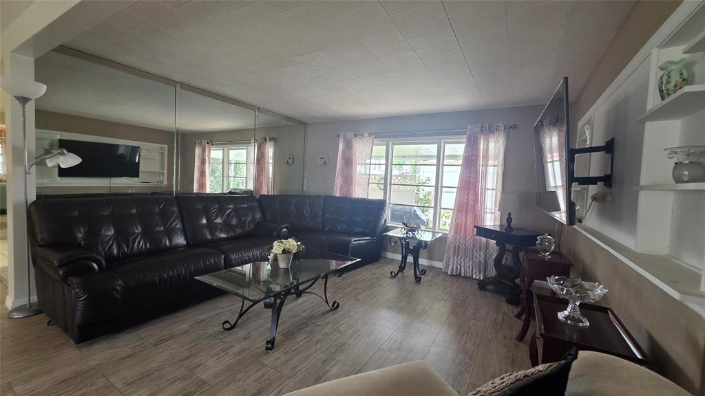 1931 Southwest 85th Avenue Davie, FL 33324 - Photo 20 of 35 a living room with furniture and a window