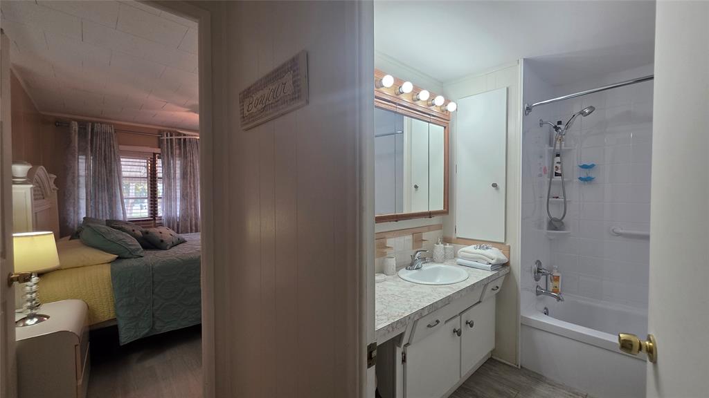 1931 Southwest 85th Avenue Davie, FL 33324 - Photo 25 of 35 a spacious bathroom with a shower a sink and a mirror