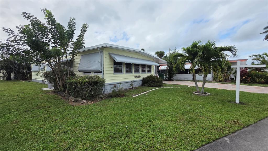 1931 Southwest 85th Avenue Davie, FL 33324 - Photo 3 of 35 a house view with a garden space