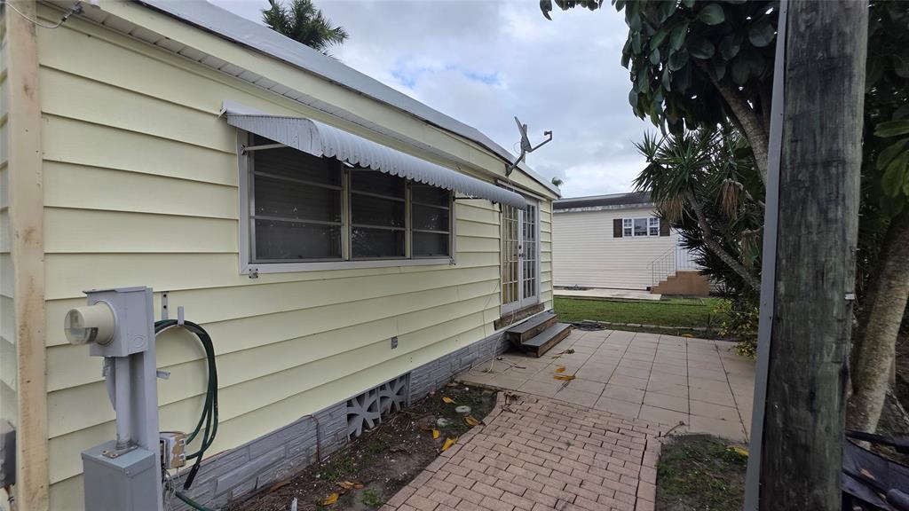 1931 Southwest 85th Avenue Davie, FL 33324 - Photo 6 of 35 a house view with a backyard