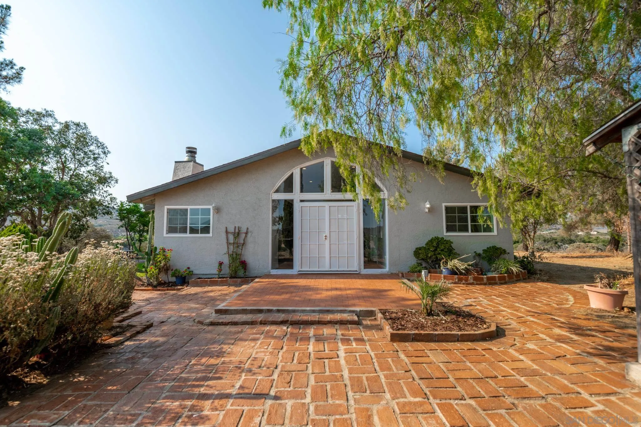 25511 Potrero Valley Road Potrero, CA 91963 - Photo 1 of 48 a front view of a house with a yard