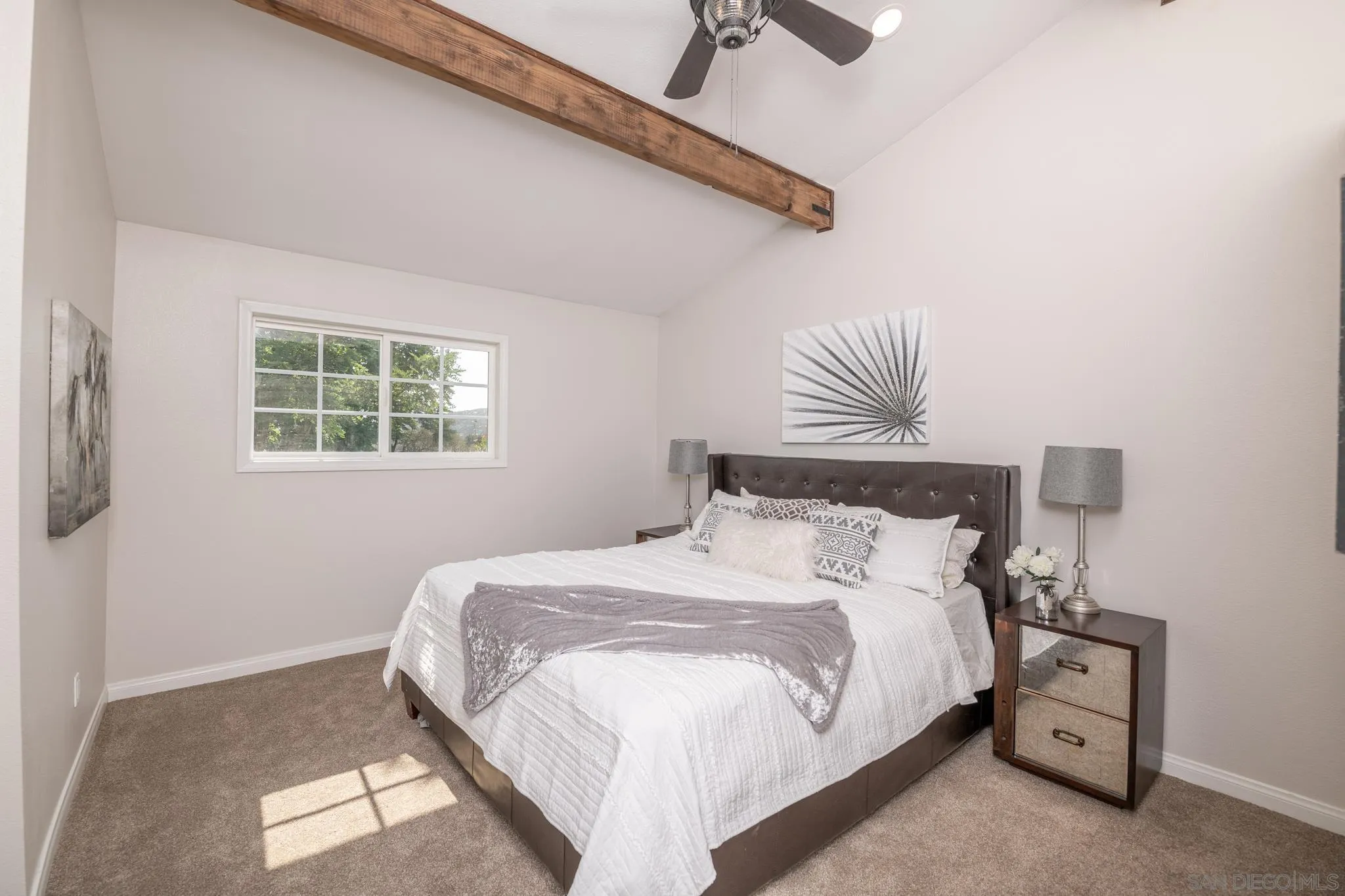 25511 Potrero Valley Road Potrero, CA 91963 - Photo 24 of 48 a bedroom with a bed and a chair