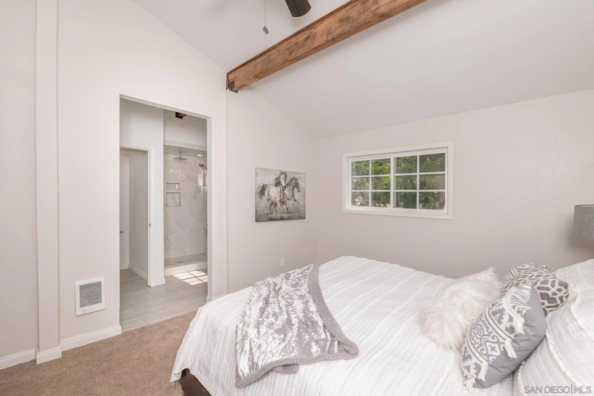 25511 Potrero Valley Road Potrero, CA 91963 - Photo 26 of 48 a bedroom with a bed and a window