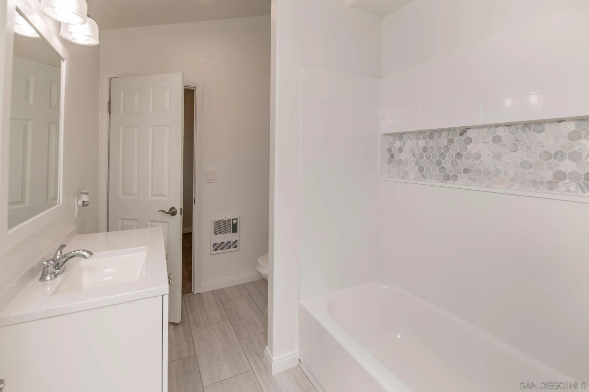 25511 Potrero Valley Road Potrero, CA 91963 - Photo 33 of 48 a bathroom with a bathtub and a sink