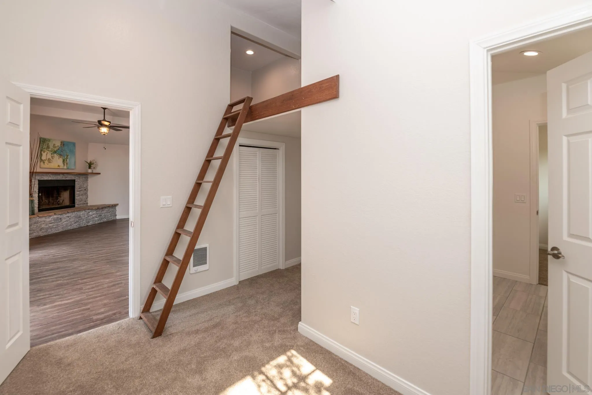25511 Potrero Valley Road Potrero, CA 91963 - Photo 36 of 48 a view of a hallway with staircase