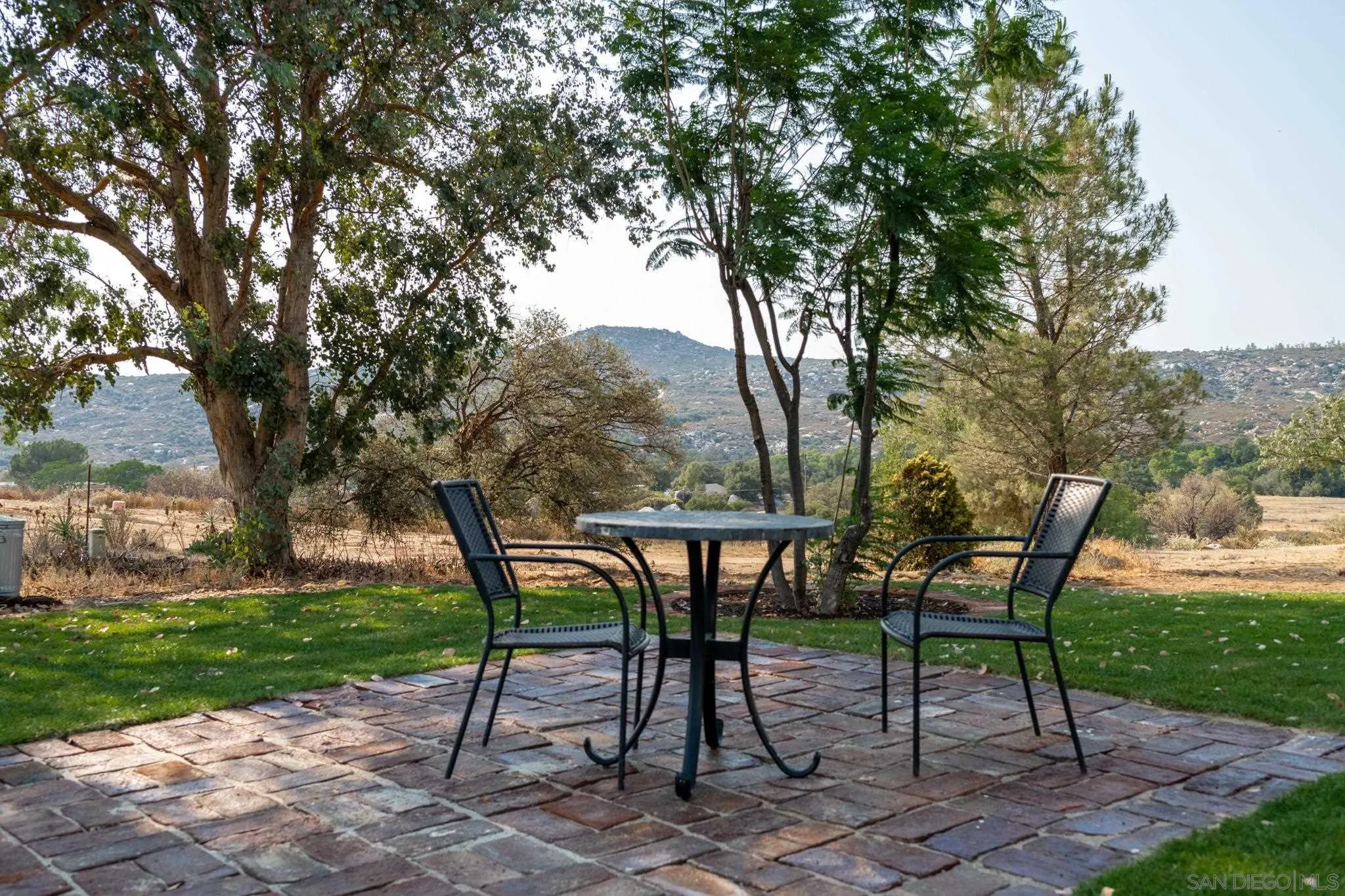 25511 Potrero Valley Road Potrero, CA 91963 - Photo 40 of 48 a view of a chairs and table in the garden