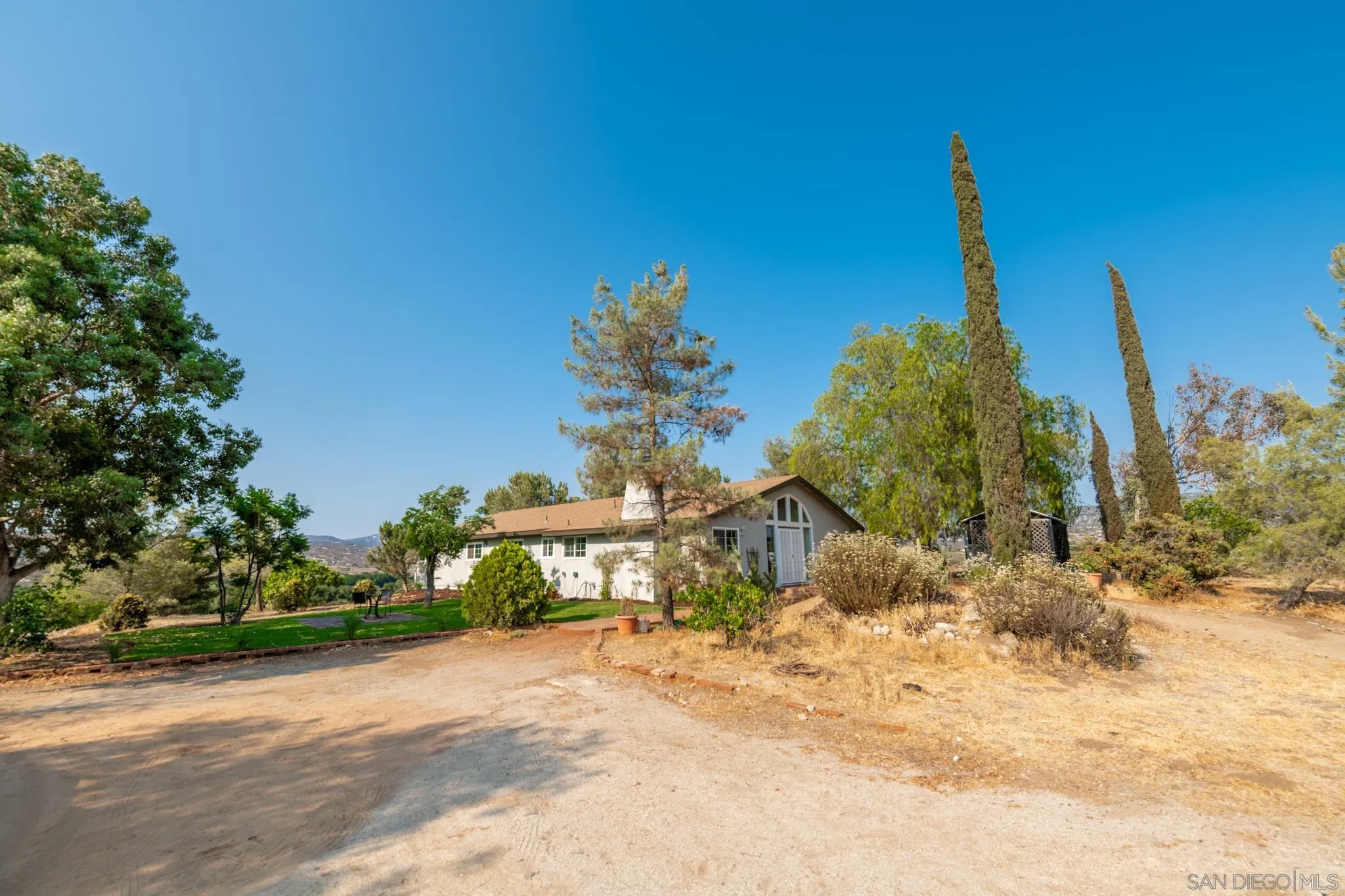 25511 Potrero Valley Road Potrero, CA 91963 - Photo 47 of 48 a view of a yard with a tree