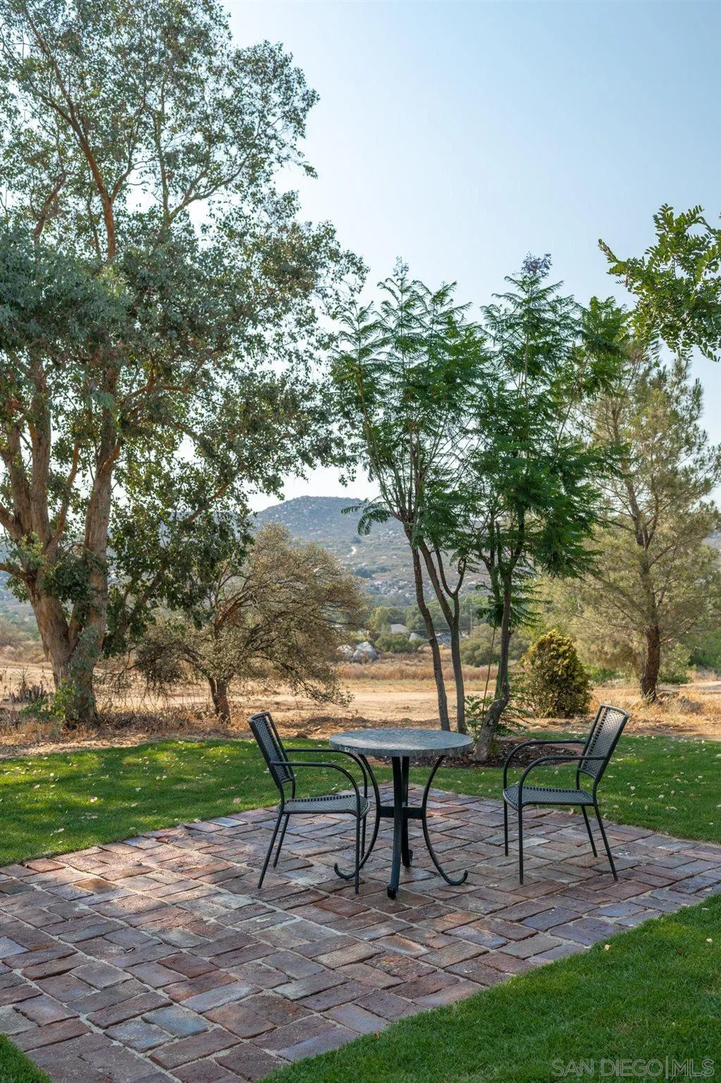 25511 Potrero Valley Road Potrero, CA 91963 - Photo 5 of 48 a view of a bench in a garden