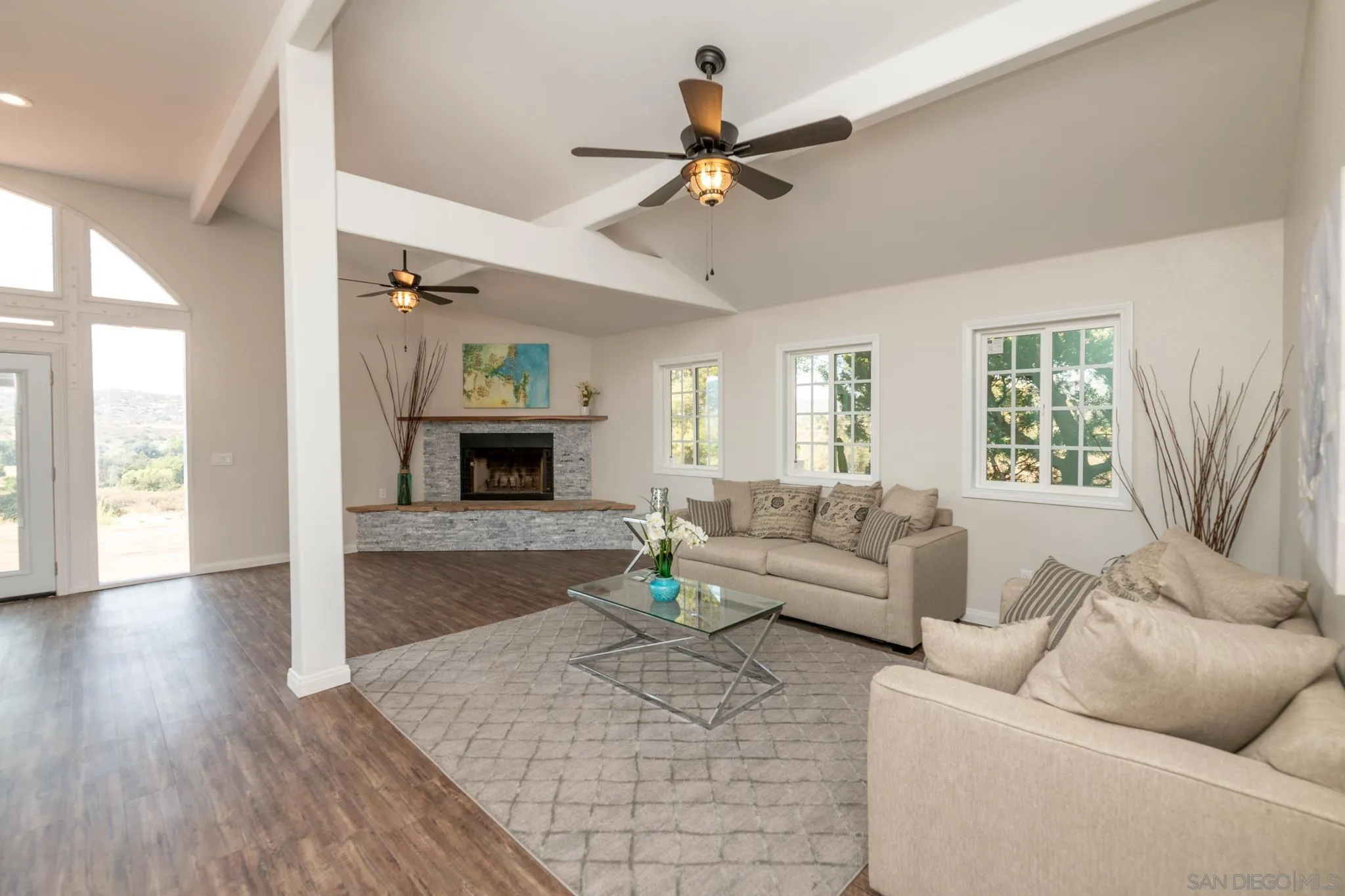 25511 Potrero Valley Road Potrero, CA 91963 - Photo 6 of 48 a living room with furniture and a fireplace