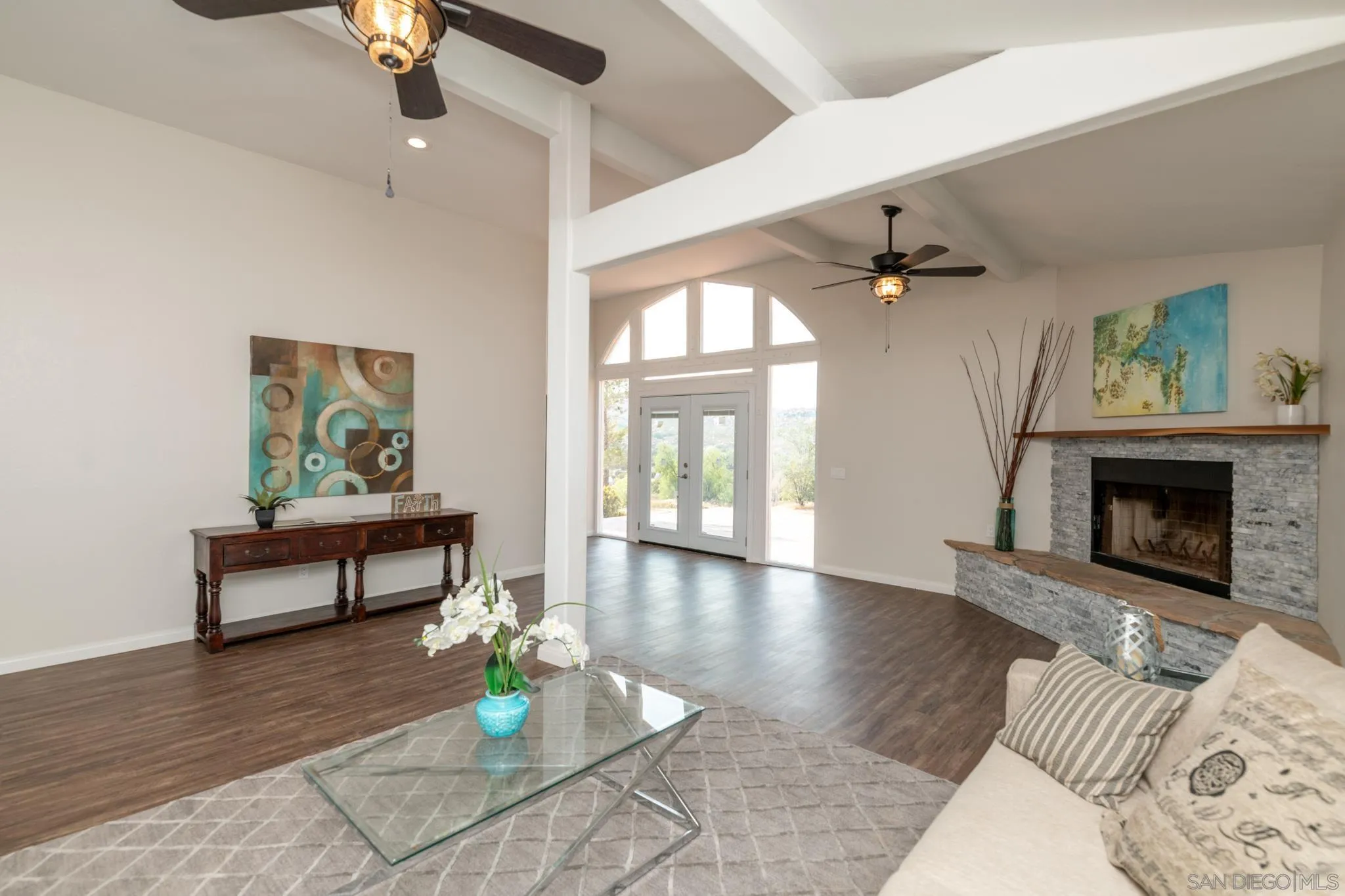 25511 Potrero Valley Road Potrero, CA 91963 - Photo 7 of 48 a living room with furniture and a fireplace