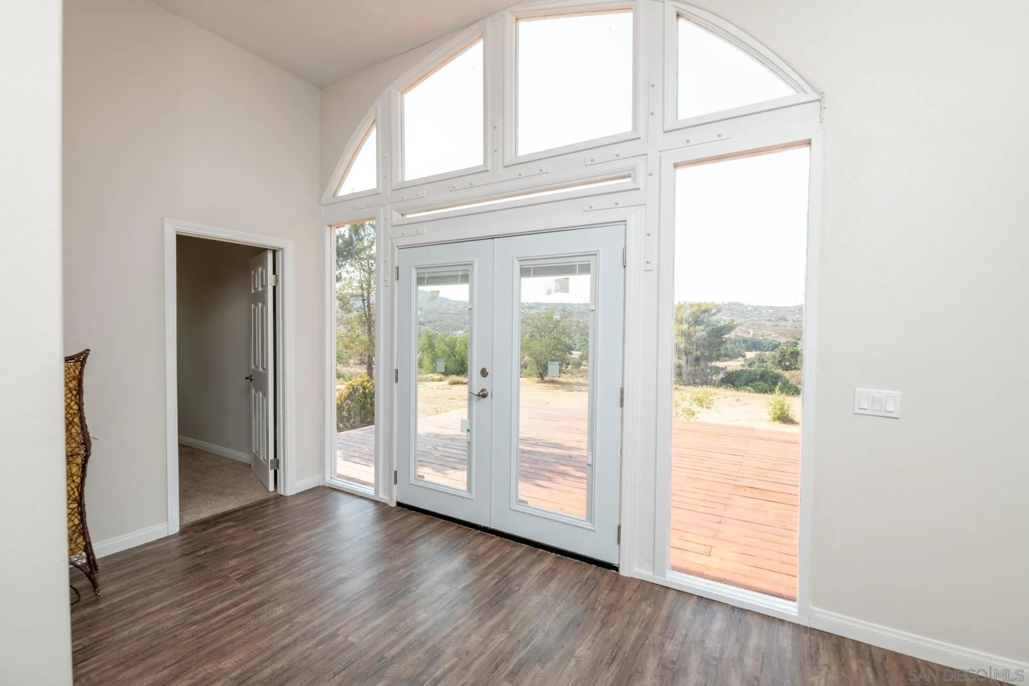 25511 Potrero Valley Road Potrero, CA 91963 - Photo 8 of 48 a view of front door with wooden floor