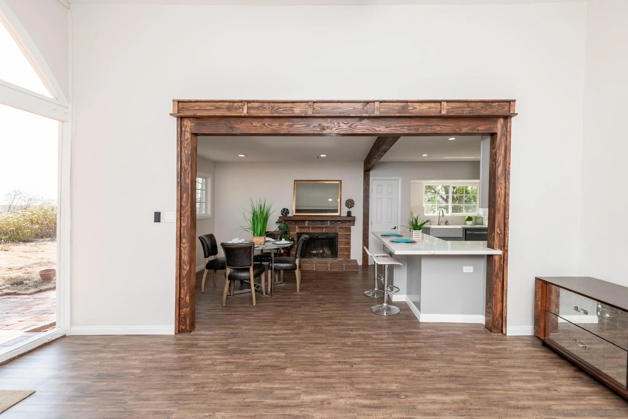 25511 Potrero Valley Road Potrero, CA 91963 - Photo 10 of 48 a view of a dining room with furniture and wooden floor