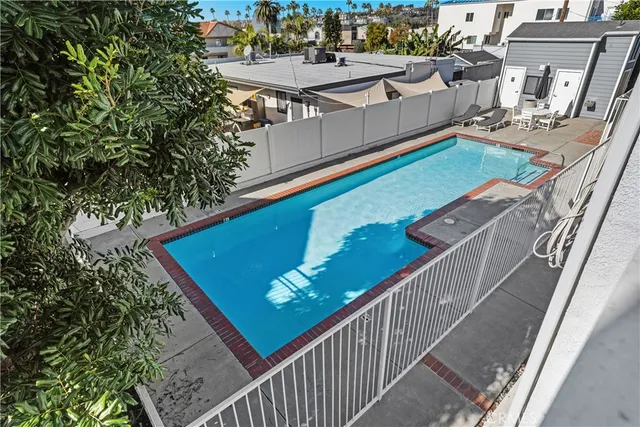 a view of a balcony with chairs