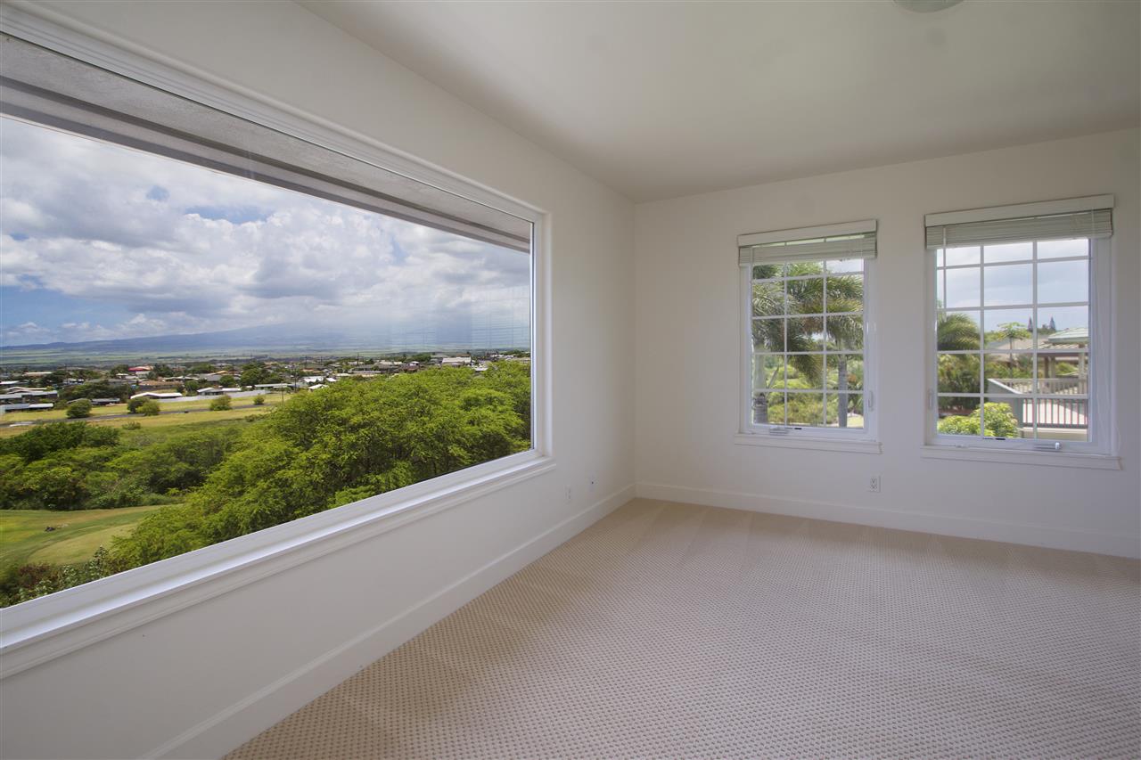 75 Kamalei Circle Kahului, HI 96732 - Photo 13 of 24 wooden floor in an empty room with a window