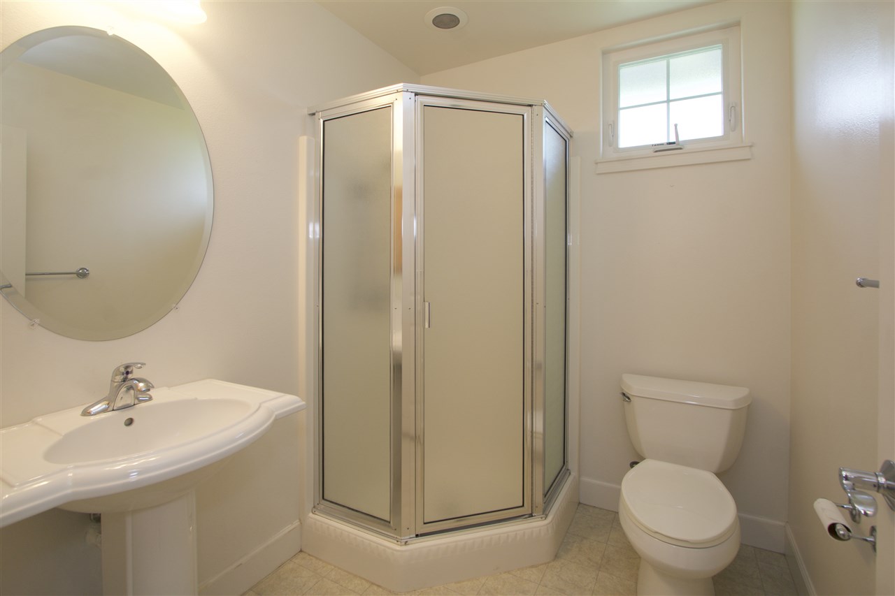 75 Kamalei Circle Kahului, HI 96732 - Photo 21 of 24 a bathroom with a toilet a sink a mirror and a shower