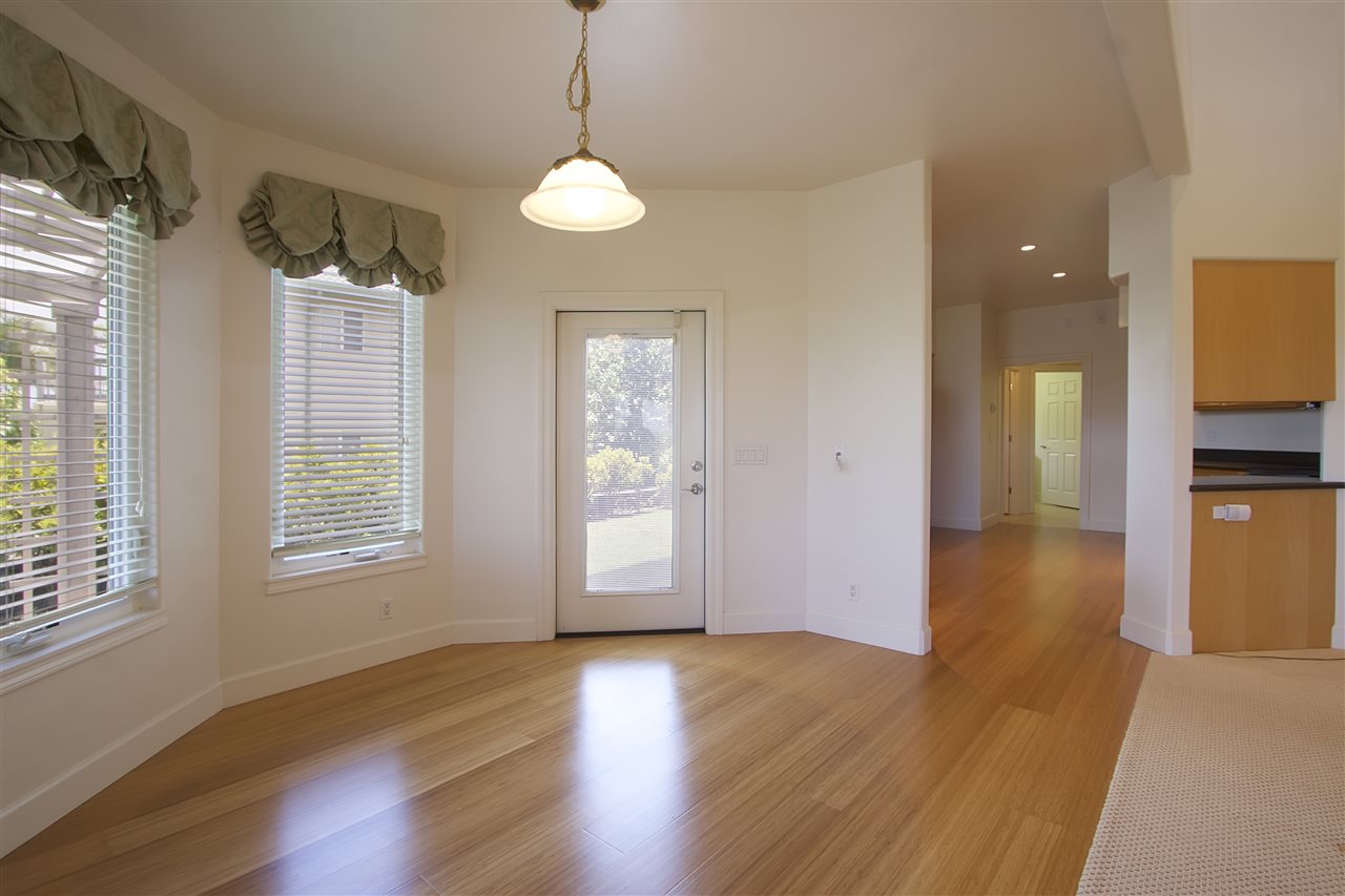 75 Kamalei Circle Kahului, HI 96732 - Photo 5 of 24 a view of an empty room with wooden floor and a window